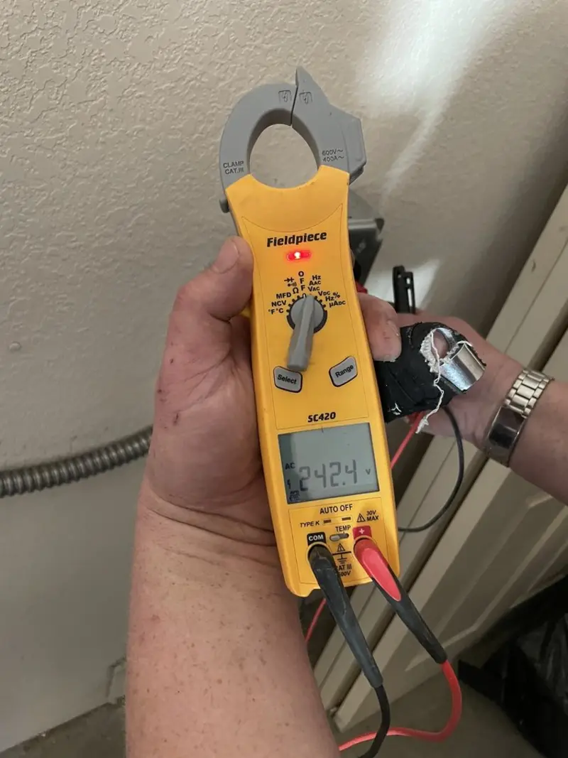 Voltage testing with clamp meter during Generator Installation in Salisbury